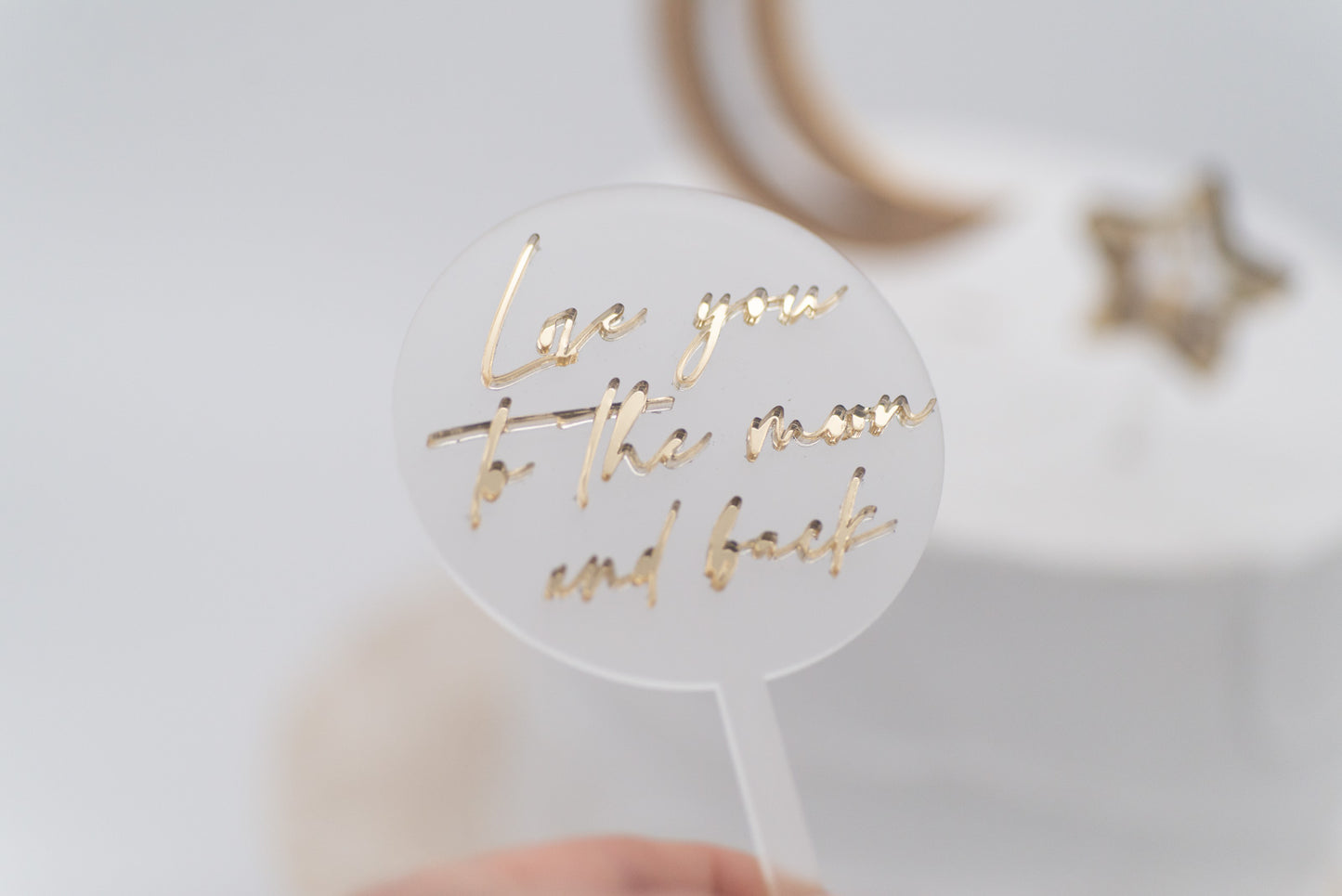 Caketopper mit goldenem Spruch Love you to the moon and back